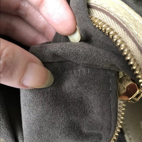 Louis Vuitton Mahina bag